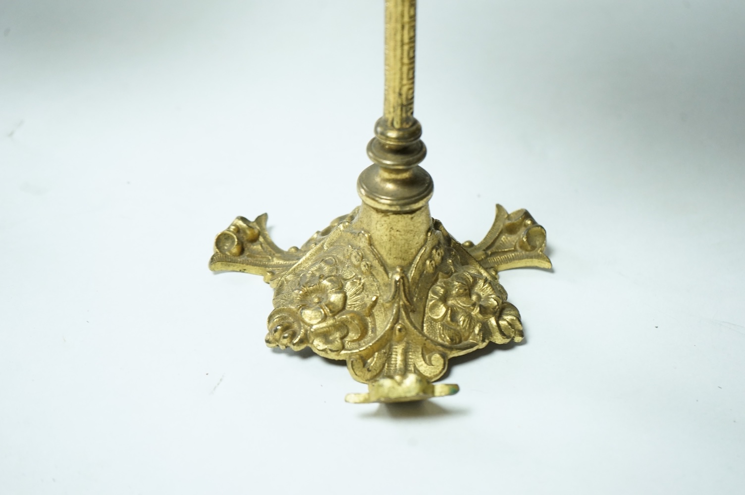 A pair of 19th century cast brass table screens, with floral Berlin Bead worked banners. 54cm high. Condition - the fringing has worn in places, silk backing has torn, both could be removed.